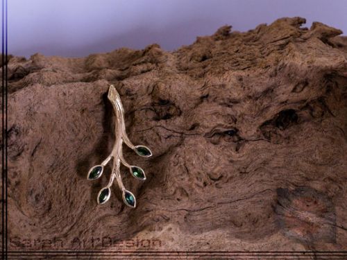 broche or jaune grenat tsavorite